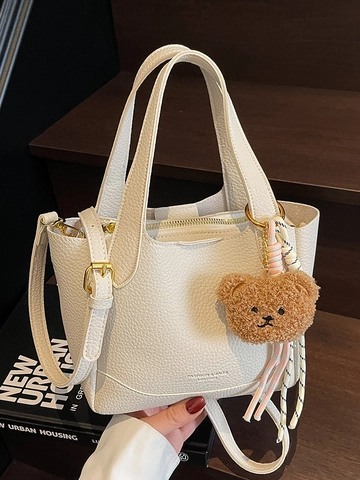 Borsa a Secchiello da Donna Minimalista in Pelle PU Stile Coreano Versatile Trama Litchi Borsa a Tracolla a Mano Con Charm Orso Pendolare