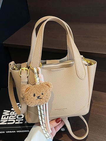 Borsa a Secchiello da Donna Minimalista in Pelle PU Stile Coreano Versatile Trama Litchi Borsa a Tracolla a Mano Con Charm Orso Pendolare