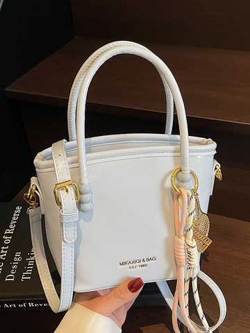 Style Coréen Femmes PU Cuir Sac Seau Minimaliste Sac Bandoulière Tote Bag Avec Pendentif Raquette de Tennis Sac à Main Polyvalent