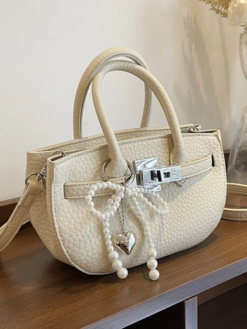 Sac Seau pour Femmes en Cuir PU Grainé de Litchi Avec Pendentif Nœud en Perles Fermeture à Verrou Sac à Main Bandoulière