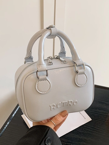 Sac Boston Rétro pour Femmes en Cuir PU Sac Bandoulière Mode Couleur Unie Lettre Gaufrée Sac à Main Double Poignée