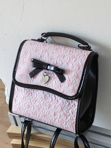 Sac à Dos Femme Mode Nœud Doux Gaufré Pendentif Cœur Sac à Bandoulière Multi Usage Tissu Composite PU Sac d'École Étudiant