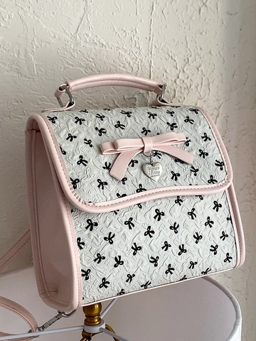 Sac à Dos Femme Mode Nœud Doux Gaufré Pendentif Cœur Sac à Bandoulière Multi Usage Tissu Composite PU Sac d'École Étudiant