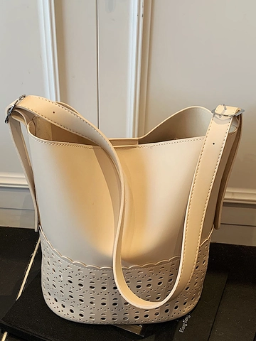 Women Fashion Laser Cutout Bucket Bag PU Leather Large Capacity Shoulder Crossbody Bag Minimalist Wave Edge Solid Color Bag