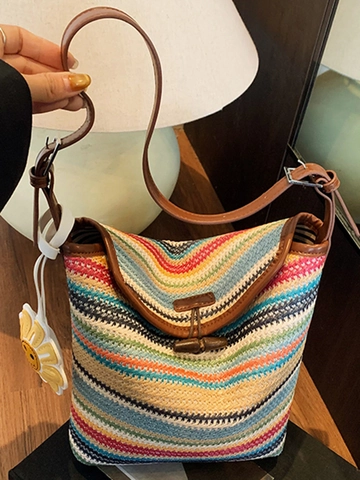 2025 Nuevo Bolso Cubo de Paja Tejida a Rayas para Mujer Gran Capacidad Bolso de Hombro con Dije de Girasol Moda de Verano