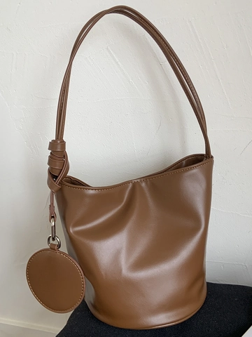 Sac Seau en Cuir PU Simple pour Femmes Sac à Bandoulière Cylindrique Minimaliste Avec Bandoulière Nouée et Pendentif Rond