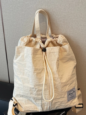 Zaino Giapponese con Coulisse per Donna Uomo Impermeabile Grande Capacità Borsa da Scuola Casual in Tessuto Zaino da Viaggio con Etichetta