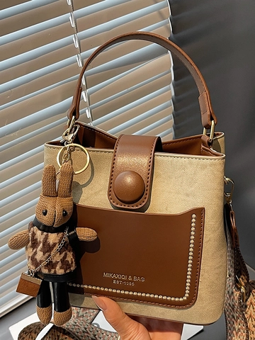Fashion Retro PU Leather Bucket Bag For Women Contrast Color Patchwork Shoulder Bag With Woven Strap And Rabbit Pendant