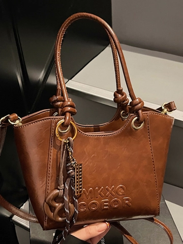 Women Retro PU Leather Bucket Bag Minimalist Solid Color Shoulder Crossbody Bag With Knot Handle And Embossed Letter Detail