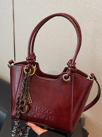 Women Retro PU Leather Bucket Bag Minimalist Solid Color Shoulder Crossbody Bag With Knot Handle And Embossed Letter Detail