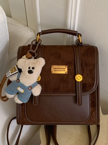 Mochila de Cuero PU Vintage con Bloques de Color para Mujer Estilo Coreano Retro Bolso Pequeño para Viajes con Colgante Oso