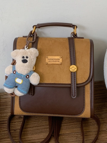 Mochila de Cuero PU Vintage con Bloques de Color para Mujer Estilo Coreano Retro Bolso Pequeño para Viajes con Colgante Oso