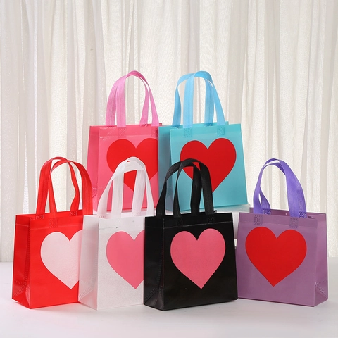 Valentinstag Vliesstoff Geschenktüte Mit Herz-Druck Wasserdichte Shopping Handtasche Für Hochzeit Party Festliche Geschenkverpackung