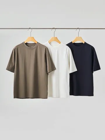 Men Casual Solid Color T-Shirt Cotton Blend Breathable Loose Fit Round Neck Short Sleeve Drop Shoulder Applique Tee Top