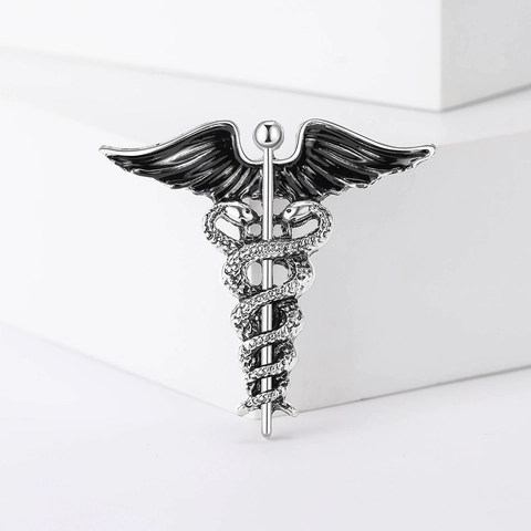 Spilla Caduceo in Lega Vintage Smalto Scettro Serpente Ali di Angelo Pin Revers Simbolo Medico Gioielli Accessorio per Abito