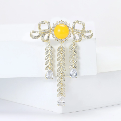 Vintage Koperen Zirconia Bloem Kwastje Broche voor Vrouwen Elegante Paleis Strik Gele Steen Micro Inleg Reversspeld