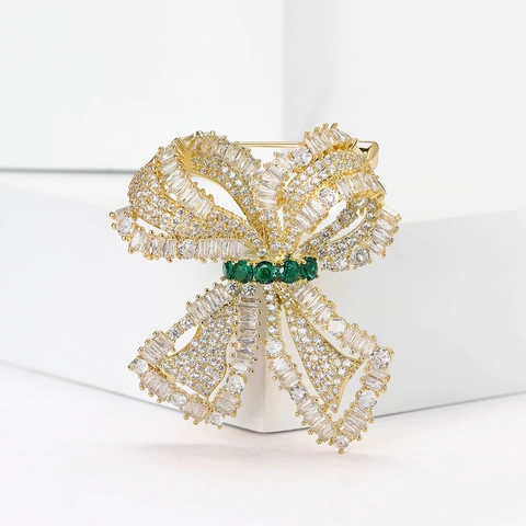 Eleganter Kupfer Bogen Brosche Mikroeingelegt Zirkonia Mit Grünem Akzentstein Gold Silber Überzogener Schleife Korsage Pin Damen Schmuck