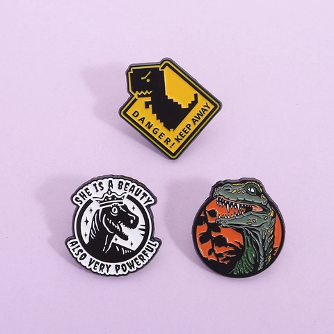 Cartoon Dinosaur Enamel Brooch Alloy Painted Animal Badge Danger Sign T-Rex Head Crown Dinosaur Pins For Clothes Bag Accessories Jewelry Gift