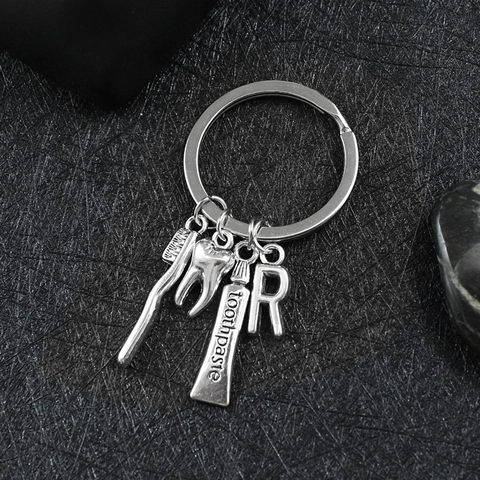 Porte-Clés en Métal Thème Dentaire Créatif Brosse à Dents Dent Dentifrice Pendentif Initiale Argent Alliage de Zinc Cadeau