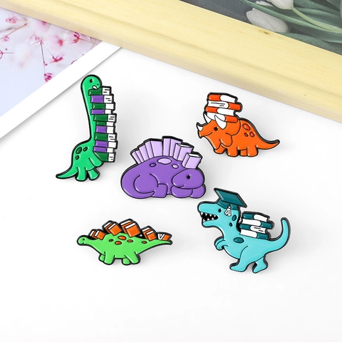 Cartoon Cute Dinosaur Reading Books Enamel Brooch Pin Creative Alloy Dinosaur Badge For Student Backpack Jacket Decoration