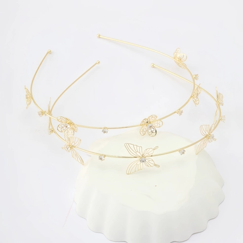 Cerchietto a Farfalla Svuotata di Moda in Lega Galvanica con Strass Elegante Accessorio per Capelli Scintillante da Donna