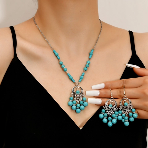 Ensemble de Bijoux Collier et Boucles d'Oreilles Turquoise Bohême Ethnique avec Glands Pendentif Mandala Ajouré en Alliage Argenté