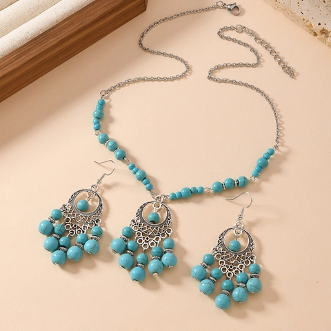 Ensemble de Bijoux Collier et Boucles d'Oreilles Turquoise Bohême Ethnique avec Glands Pendentif Mandala Ajouré en Alliage Argenté