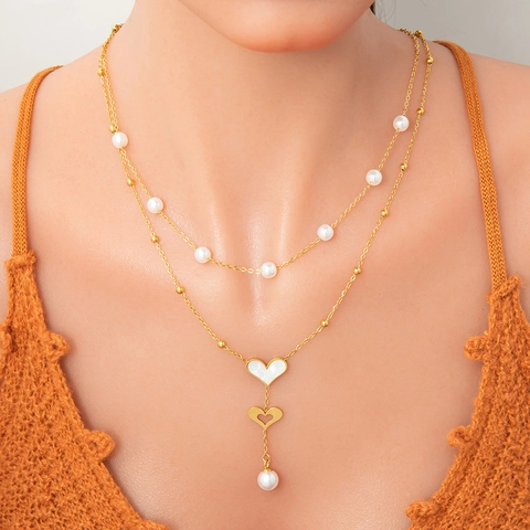 Collana a Doppio Strato in Acciaio Inossidabile Vintage Ciondolo a Forma di Farfalla a Cuore con Perle Artificiali Gioielli di Nicchia Placcati in Oro per Donna