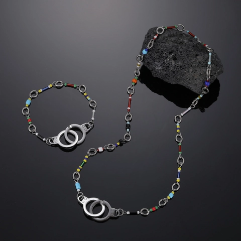 Gioielli Manette in Acciaio al Titanio Punk Braccialetto e Collana con Perline Colorate per Uomo Donna Stile Hip Hop Streetwear