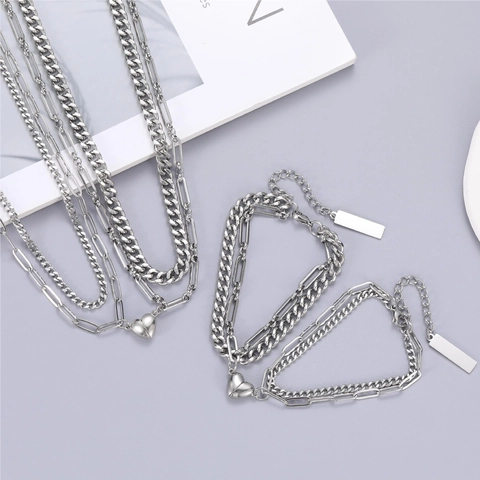 Braccialetto di Coppia Cuore Magnetico in Acciaio Inossidabile Lucido Minimalista Gioielli Attrazione Cuore Regalo San Valentino