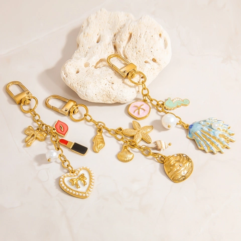 Portachiavi in Acciaio Inossidabile Conchiglia Perla Artificial Ciondolo Borsa Smalto Stella Marina Cavalluccio Labbra Per Donna