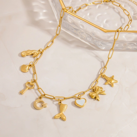 Collana Donna in Acciaio Inossidabile Placcato Oro a Graffetta con Ciondoli Ippocampo Conchiglia Luna Cuore Stella Marina