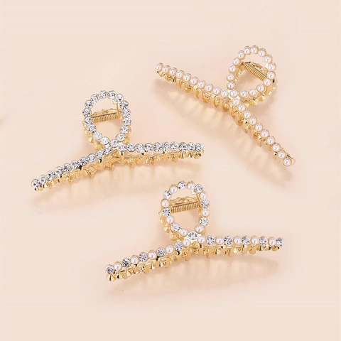 Eleganter Legierung Strass Künstliche Perle Haarkralle Gold Galvanisiert Geometrisch Shark Clip Für Damen Hochzeit Party Haarschmuck