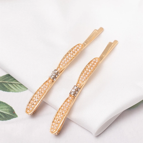Eleganti Fermagli per Capelli in Lega Dorata con Künstliche Perle Finte e Strass a Fiocco per Donna Stile Coreano Semplici Forcine Laterali
