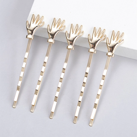 Einzigartige Kreative Handfläche Handform Edelstahl Haarklammer Minimalistisch Gold Metallic Bobby Pin Damen Mode Haarschmuck