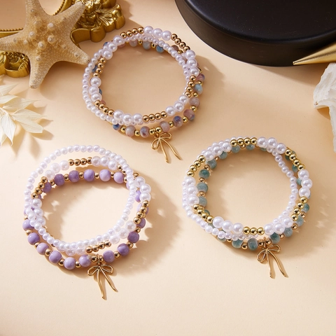 Pulseras de Perlas Artificiales de Moda Con Lazo Para Mujer Cuentas de Aleación Cerámica Diseño de Nicho Dulce Joyería Regalo