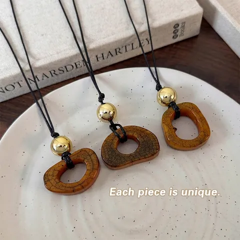 Retro Künstlerisch Kamelknochen Anhänger Halskette Mit Metallperle Unregelmäßiger Ring Lange Wachsseil Pullover Kette Schmuck