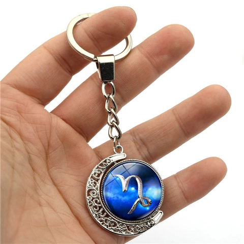 Porte-clés Zodiaque Lune Rotatif Double Face Lumineux Alliage de Zinc Verre Motif Ciel Étoilé Pendentif Accessoire Sac