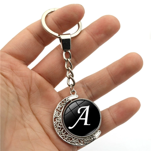 Porte-clés Lune Rotative en Alliage de Zinc Vintage Pendentif Alphabet Initiale Gemme du Temps Anneau Métallique Double Face Cadeau