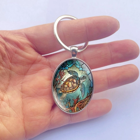 Llavero con Colgante Ovalado Patrón de Tortuga Marina Metal Plateado Tema Marino Llavero de Animal Regalo para Amantes del Océano