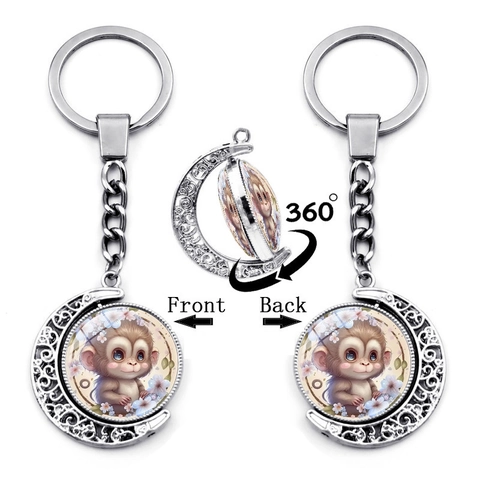 Portachiavi a Forma di Luna Rotante in Lega di Zinco Argento Con Motivo a Scimmia Cartone Animato Design Traforato Pendente per Borsa