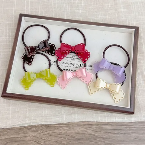Koreanischer Stil Süße Süßigkeitenfarbe Schleife Haargummi Hochelastisch Hohl Harz Schleife Pferdeschwanz Halter Modischer Haarschmuck