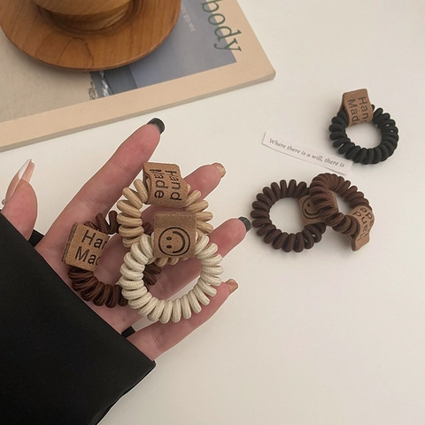 Minimalistische Telefonkabel Spirale Haargummis Erdton Elastische Spurenlose Haarspulen Mit Lederetikett Smiley Gesicht Damen