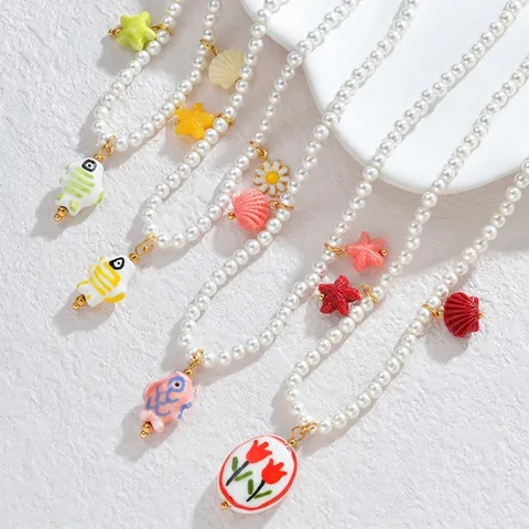 Collana di Künstliche Perle in Stile Francese in Acciaio Inossidabile Placcato Oro Catena di Perline Ciondolo Fiore Stella Marina Conchiglia Gioielli Estivi Donna