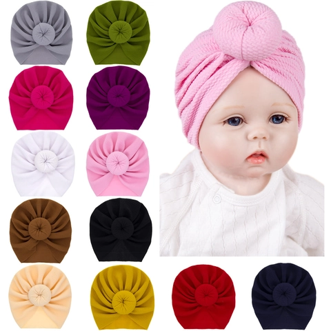Weiche Acryl Strick Baby Turban Mütze Donut Knoten Stirnband Für Neugeborene Kleinkinder Waffelstruktur Beanie Haar-Accessoires