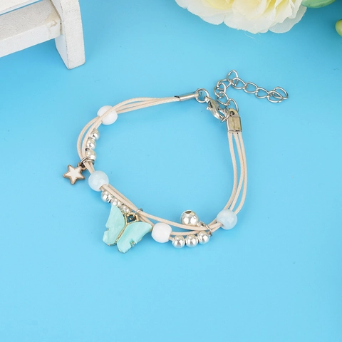 Süßes Handgefertigtes Gewebtes Armband Mit Hellblauen Schmetterlingsanhängern Stern Glocken Perlen Verstellbares Wachskordel Armband Für Damen Schmuck