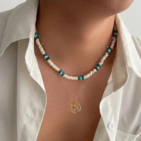 Collier Double Rang Bohème pour Homme Perles en Bois de Coco Alliage Pendentif Pièce Nautilus Or Chaîne de Clavicule Bijoux