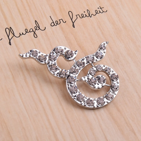 Silberton Legierung Strass Eingelegt Brosche Elegant Thailändische Nummer Neun Wirbel Design Gedenk Pin Für Damen Herren