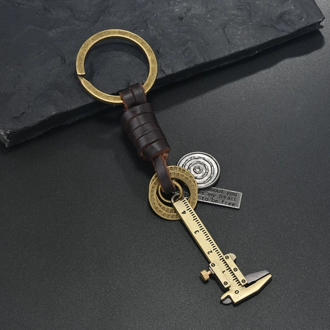 Porte-clés en Cuir Industriel Vintage Avec Pendentif Pied à Coulisse Alliage Bronze Tissé Cuir de Vachette Homme Femme