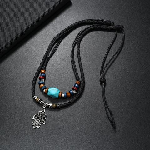 Handgefertigte Boho Retro Hand der Fatima Anhänger Halskette Mehrlagig Künstlicher Türkis Holzperlen Geflochtene PU Leder Kette